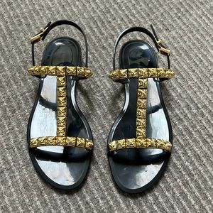Stuart Weitzman black and gold jelly sandals